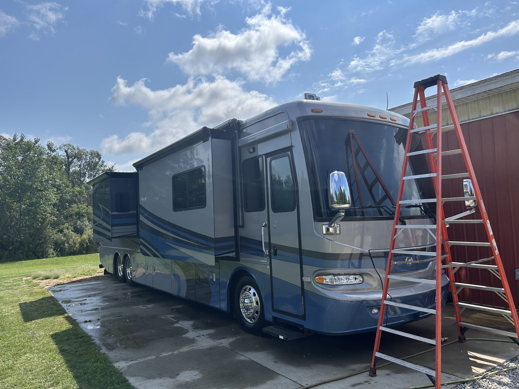 Monaco Camelot Class A motorhome - Passenger side view after exterior detail